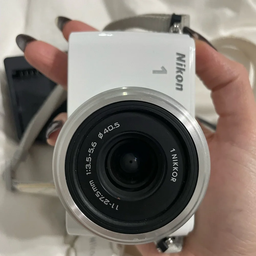 Nikon 1 S1 10.1MP Digital Camera - White (Kit w/ 11-27.5mm Lens) Pre-Owned